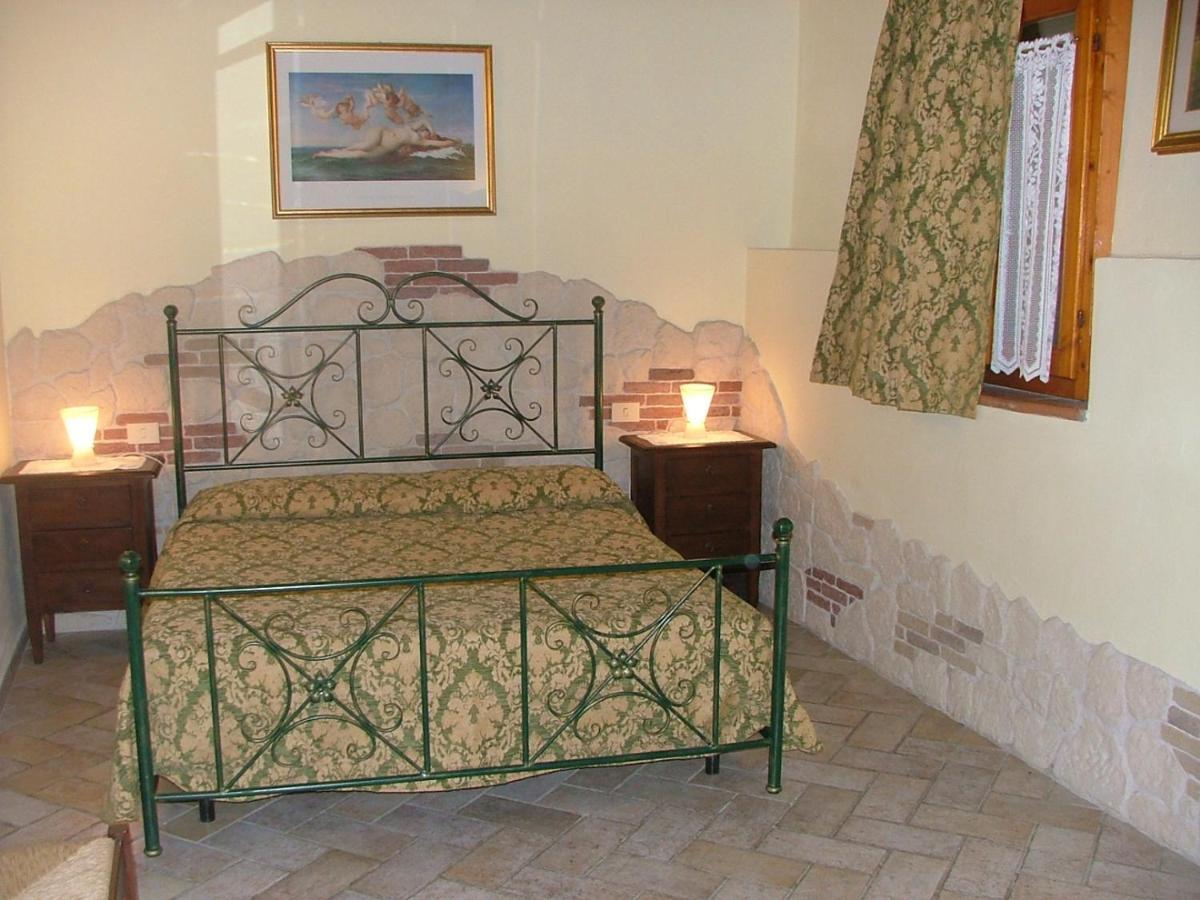 Casa Vacanza Le Case Сан-Джиминьяно Экстерьер фото