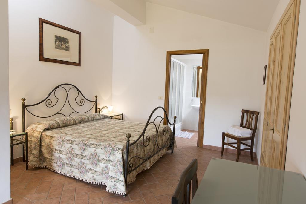 Casa Vacanza Le Case Сан-Джиминьяно Экстерьер фото