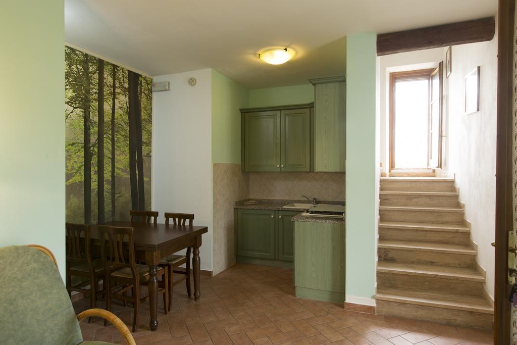 Casa Vacanza Le Case Сан-Джиминьяно Экстерьер фото