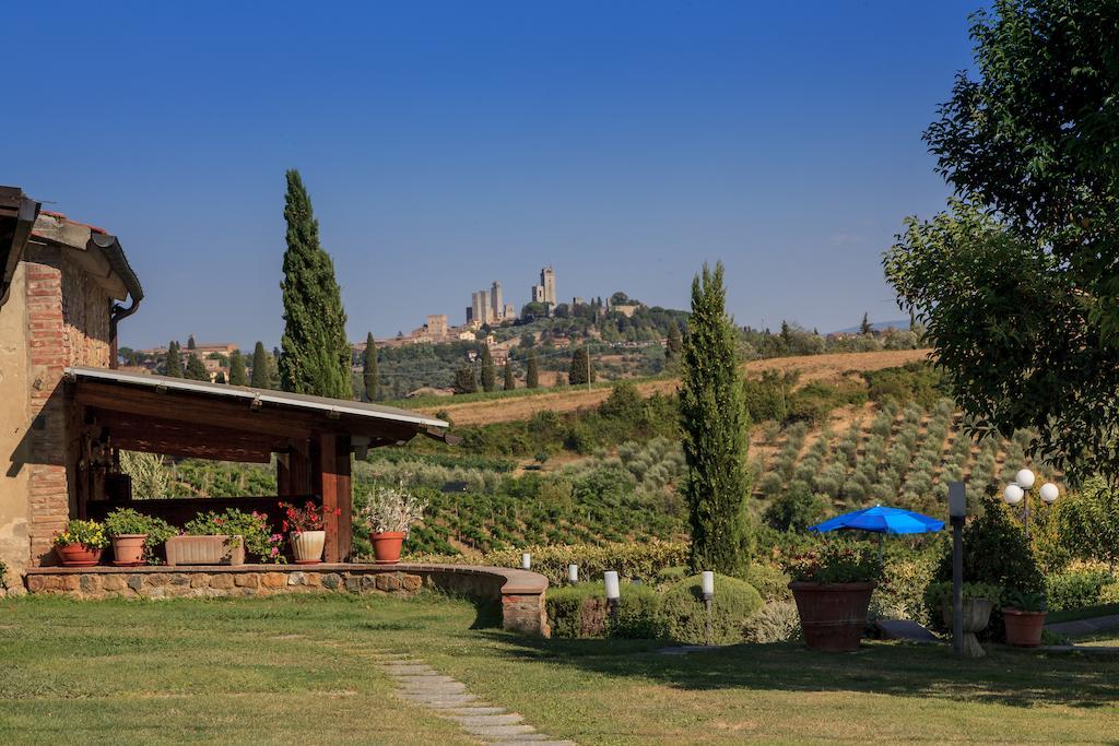 Casa Vacanza Le Case Сан-Джиминьяно Экстерьер фото