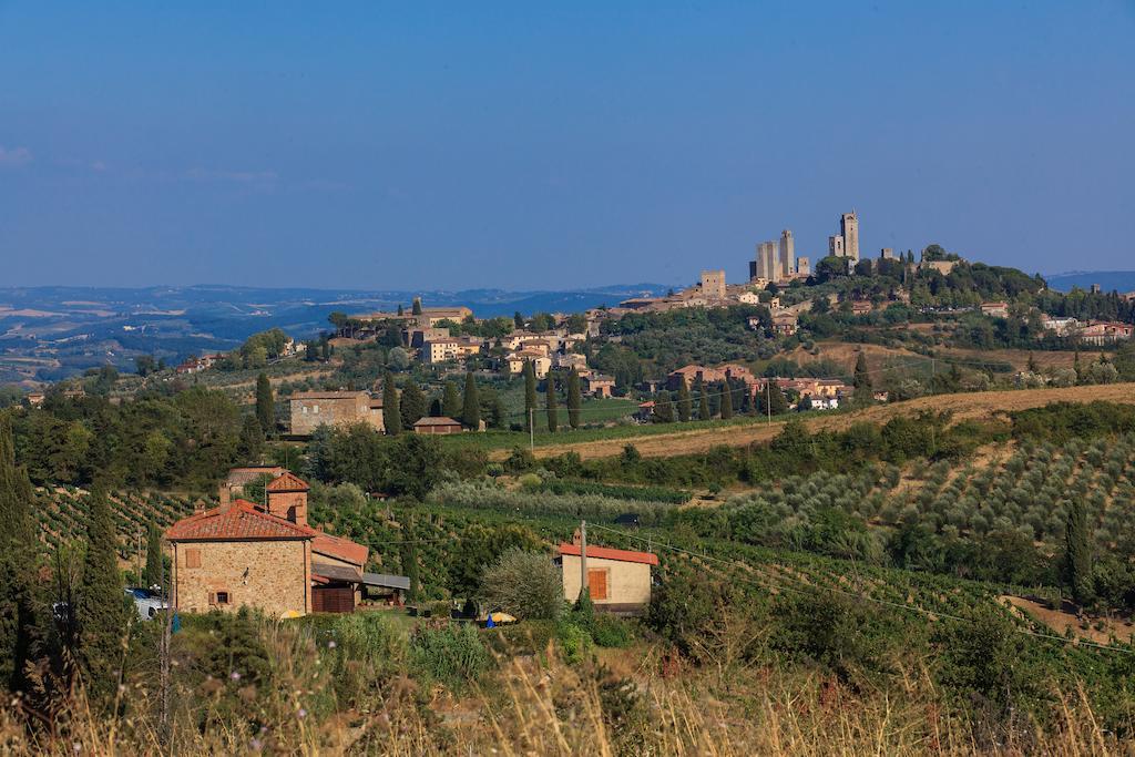 Casa Vacanza Le Case Сан-Джиминьяно Экстерьер фото